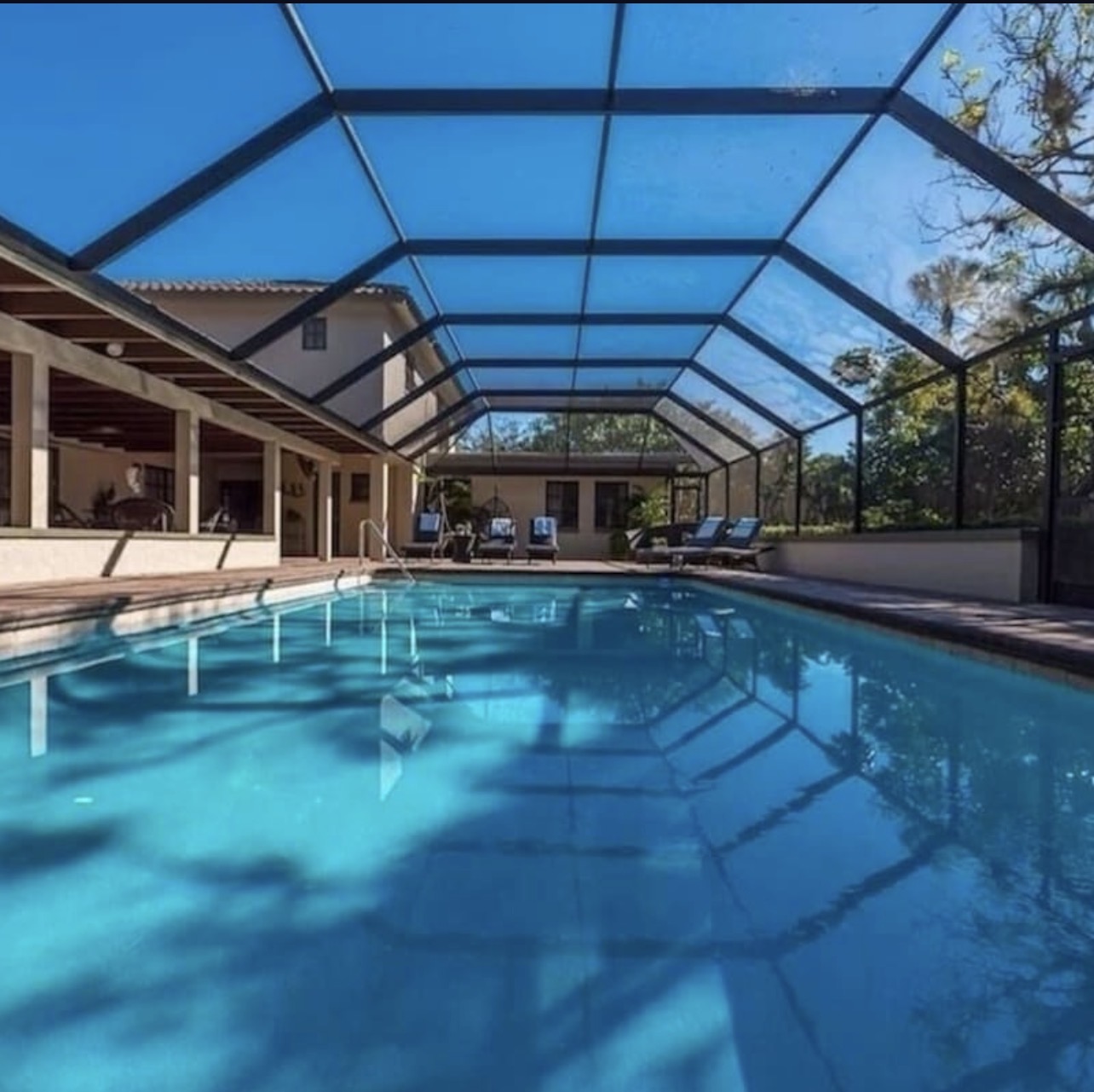The 30+ foot screened indoor pool at the SSU Workshops estate